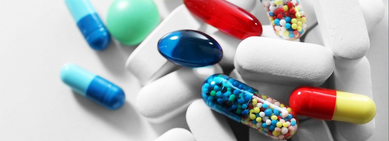 close-up shot of a pile of colourful pills
